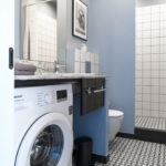 Modern bathroom at MIRO Rooms in Riga with stylish fixtures.