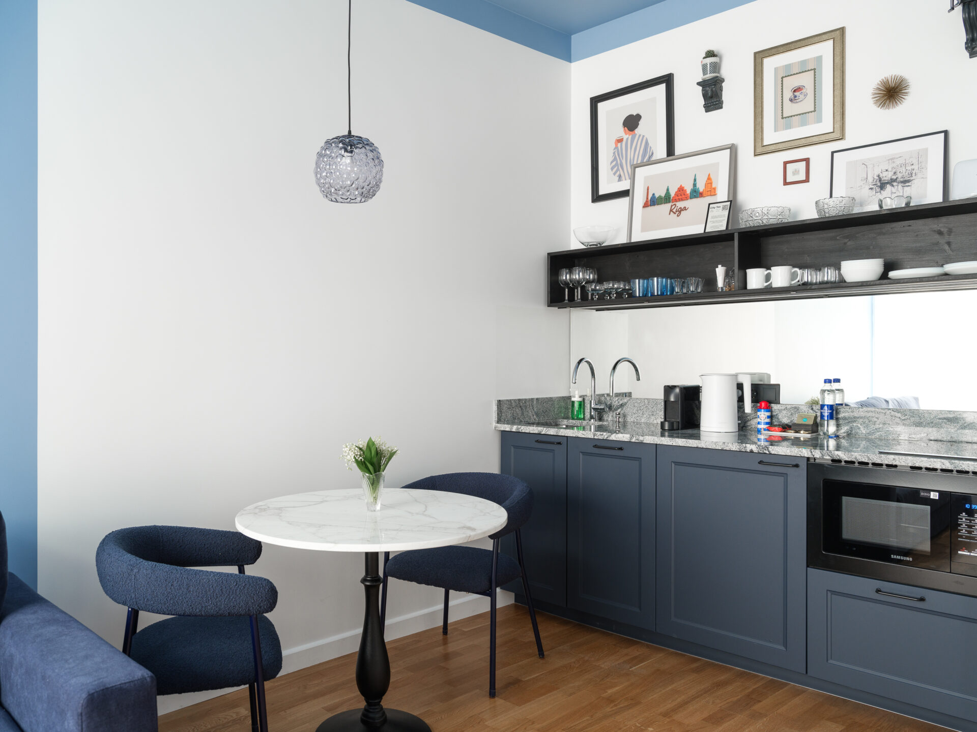 Cozy kitchen area in MIRO Rooms accommodation in Riga.