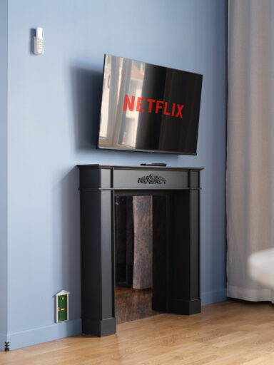 Modern accommodation in Riga with Netflix access at MIRO Rooms.